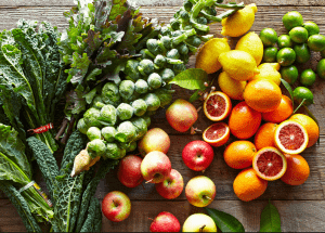 a group of fruits and vegetables on a wood surface Healthy Weight Loss Diets Livingston